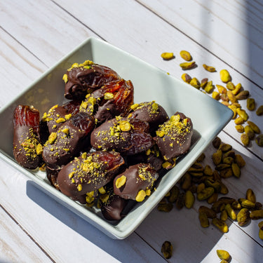 One Bite | Pistachio Palm Bites - Palm Bites® - Chocolate Dates -